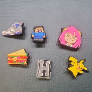 **Assorted Kids Shoe Charms and Cartoon Pins - Pink, Yellow, Blue, Gray**